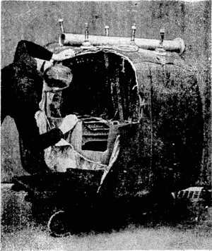 Fox Photo. A rubber-covered petrol Lank—knoivn as a self-sealing: tank—-which ''holds 280 gallons. It ivas taken from a German bomber brought. doivn in England. ~ These tanks are designed to . prevent loss of petrol through bullet holes, and similar tanks are used in British aircraft. ' (Evening Post, 19 November 1940)