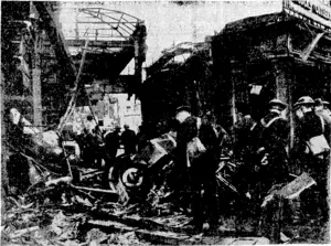 During a recent raid on London a German bomber was brought down, the fuselage and ivings falling on a roof near Victoria Station and the undercarriage (seen in the picture) falling just outside the station. (Evening Post, 19 November 1940)