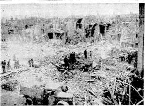 Widespread damage to a residential section of London d uring a recent air raid. (Evening Post, 27 April 1944)