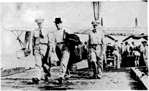 The Prime Minister, Mr. Fraser, on his way to -Vbndon, leaving a United States Naval Air Transport Service plane at a naval air station near Pearl Harbour in company with Admiral Chester W. Nimitz (left), Commander-in-Chief Pacific, and Vice-Admiral Robert L. Ghormley, Commandant 14th Naval District. (Evening Post, 02 May 1944)