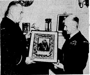 R.N.Z.A.F. Photo. Presentation by Air Marshal L. S. Breadner, Air Officer Commandingin-Chief R.C.A.F. overseas, of a framed scroll honouring' a New Zealander, the late Flying Officer Lloyd Allan Trigg, V.C., to Group Captain T. W. Â• White, of the New Zealand Air Liaison Mission in Ottawa. Flying Officer Trigg was trained in Canada and lost his life in a fight in the Atlantic with a U-boat, ivhich his ' aircraft sank. (Evening Post, 27 May 1944)