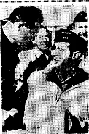 U.S. Offico of War Information Photo. An Italian priest greeting Lieut.-General Mark Clark outside the Vatican as the Allied troops entered Rome, This is a wireless picture. (Evening Post, 17 June 1944)
