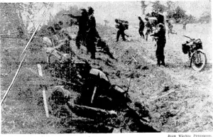 British troops attacking the enemy from a roadside near Cagny, in Normandy. (Evening Post, 27 July 1944)