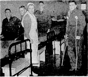 Some of the draft of sick and wounded who have returned from the Middle East awaiting medical examination at the clearing station. (Evening Post, 05 August 1944)
