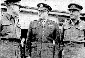 Colonel J. H. Nankivell, Military Attache at the United States Legation in Wellington, with Major C. W. H. Tripp, DS.O. (left), and Captain D. E. Williams, M.C. fright), whom he had just decorated with the United States Silver Star for gallantry in jungle fighting in the Solomons, where they led forces of Fijian guerrillas. (Evening Post, 24 August 1944)