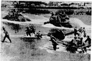 Radio photo from Moscow showing Soviet tanks and artillery forcing a river crossing when the Red Army was advancing towards Lvov, on the Ukra&ian front. S (Evening Post, 20 September 1944)