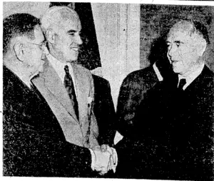 Mutual congratulations after the signing of the international petrol agreement at Washington on August 8 last. Mr. Harold L. Ickes (left), United States Petroleum Administrator, is shaking hands with Lord Beaverbrook, British Lord Privy Seal, and between them stands Mr. Edward R. Stettmius, United States Under-Secretary of State. (Evening Post, 27 September 1944)