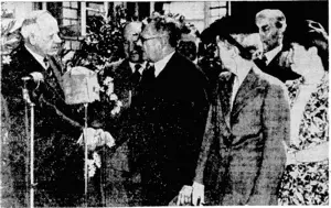 The Prime Minister, Mr. Fraser, head of the New Zealand delegation to the Commonwealth, being welcomed by the Australian Minister of External Affairs, Dr. H. V. Evatt, on arrival From the left, Mr. Fraser, Mr. McKell, Premier of New South Wales, Dr. Evatt, Mr. Jones, New Zealand Minister of Defence, Mrs. Fraser, f (Evening Post, 20 January 1944)