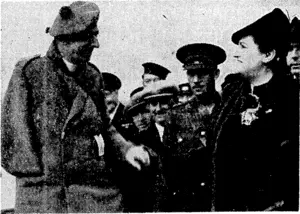 Lady Darling, Lady Provost of Edinburgh, greeting the Rev. A. A. Duff, senior chaplain to the famous 51st Division. He lost an arm and was captured at St. Valery in the early stages of the war in France, and ivas amongst the men recently repatriated from ; prisoners-of-ivar camps. (Evening Post, 26 January 1944)