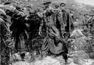 High-ranking Soviet officers who visited the Fifth Army in Italy recently, led by Major-General Vasiliev, are seen passing a wounded man who is being brought doivn the Mount Camino track on a stretcher. The battle for the mountain was in full swing at this lime. Later the mountain was captured by Allied forces. (Evening Post, 15 February 1944)