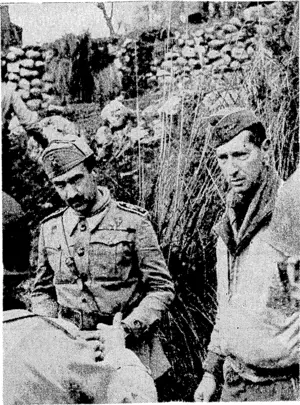 General Mark Clark (right) and General Daflno, of the Italian army noiv fighting beside the Allies, discussing Fifth Army operations in the Cassino area with war correspondents. (Evening Post, 18 March 1944)