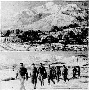 With the New Zealandcrs on the Italian battlefront. Top, tanks and transport on the slopes of a snowcovered mountain. Below, led by S. Fife (Wellington), these men of the 2nd N.Z.E.F. are seen walking across the heavy snoiv which commenced to fall on New Year's Eve. (Evening Post, 23 March 1944)