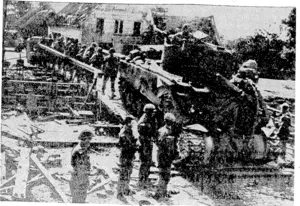 R . . British Official Photo, via Beam 'wireless!' Bnttsh tanks and infantry cross a bridge over the Bois le Due Canal, north of Eindhoven, in the advance on the Reich. (Evening Post, 02 October 1944)
