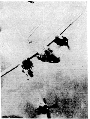 A remarkable photograph of a Marauder of the United Stales 12th Air Force hit by an anti-aircraft shell while attacking Toulon Harbour, and losing its starboard engine. The engine can be seen falling, and the iving on fire. (Evening Post, 25 October 1944)