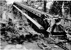 One of H>e sites tie Germans tried to destroy before retreating. This one was at Belloy-sur-Somme, near Amiens. Ihe inclined steel ramp was a runway for flying bombs. (Evening Post, 26 October 1944)