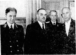 Mr. C. W. Boswell, New Zealand Minister to the U.S.S.R., presents his credentials in Moscow. From the left, Mr. Novikov, Vice-Commissar, Mr, Gospodin Shvernik, Vice-President of the Presidium, and Mr. Boswell. At the back, Mr. Timovico. (Evening Post, 26 October 1944)