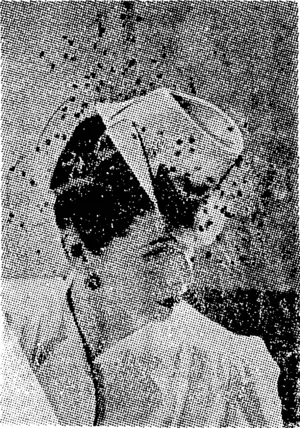 A knot of navy veiling, sprinkled with chenille spots, adds a jaunty touch to this white panama straw, with its gay little peak lipping over. ' one eye. (Evening Post, 26 October 1944)
