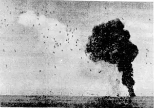Fatally stricken, a Japanese bomber plunges into the sea between two American destroyers, part of an Allied naval force guarding troops ashore in the, Philippines. (Evening Post, 13 December 1944)