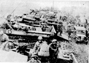 ritish infantry loading up some of the new amphibious tanks known as "Buffaloes" for the assault on Beveland, at the mouth of the Scheldt. This is the first picture of the "Buffalo" on active service. (Evening Post, 29 December 1944)