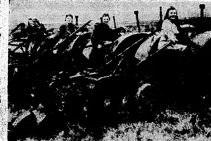 Land girls line up with their motor ploughs ready to start work. (Evening Post, 30 December 1944)