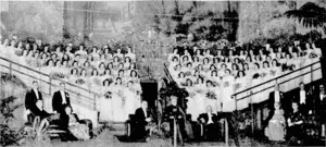 Scene in the Town Hall on Tuesday evening, when 90 debutantes were grouped on a picturesque stage after their presentation to Archbishop O'Shea, who is seen seated in front with the Mayor of Wellington, Mr. Appleton, on his right. Mrs. Appleton is seated on the right of the picture. (Evening Post, 03 August 1945)