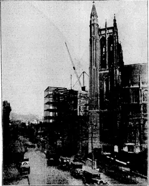 BrerUnE Post" Photo. A NEW VIEW OF AN IMPORTANT CITY CORNER.—Looking down BoiilcoU street towards the Willis street crossing and Manners street. On the right are the Church of St. Mary; of the Angels, the Y.W.C.A., and the neto SL George Hotel, whichisi&.coime of'ereetipnir r (Evening Post, 14 June 1930)