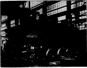 A.-P.-Godber-Photo.' BUffiDING BOCOMOTIVESaM of a nMin line locomotive on td Us wheels, usi^ (Evening Post, 09 October 1931)