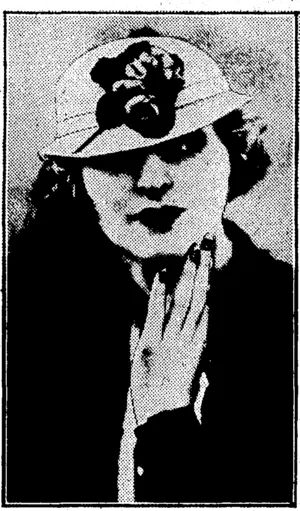 Sport «nd Gener*l" Photo. THE POPULAR FORWARD TILT ■—The tip-tilled effect is a salient feature of this Suzy model, made in. white straw enriched with j. flowers. ' '■■■."' (Evening Post, 06 May 1933)