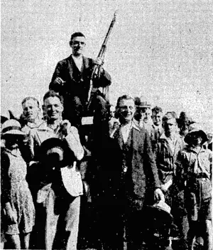 Evening Post"' Photo. KING'S PRIZEMAN.—Rifleman H. V. Croxton chdired after his win in the King's Prize at the. National Rifle Meeting at Trentham on Saturday. He ivas runner-up last year. (Evening Post, 13 March 1933)
