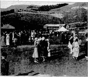 Wellington Photographic Works Photo. LINING VP.~The. horses moving into place at the start of the Maryborough Handicap at the Wairarapa Trotting Club's Meeting. flt Hutt Park on Saturday. \ ' • • ■ .' . "Evening Post" Photo. WELLINGTON COLLEGE "AT ROME."--A general vieto-of the scene dt Wellington College during , the at home which, took place there on Saturday afternoon. (Evening Post, 13 March 1933)