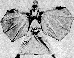 Mr. Clem Sohn, the "Bird Man," wearing the tuings. which enabled him to glide through the air, and in which he was killed last-.week- '■ end at Vincennes, near Paris, through the failure.of his parachutes. , (Evening Post, 27 April 1937)