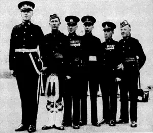 Sport and.General" Fboto. : Non-commissioned'officers of various ranks wearing the new. uniforms;to lie used .for the Coronation ceremonies. The regiments represented are the Royal Scots Greys,' Sea forth Highlanders,"West York•■■■■. shire Regiment, King's Royal Rifles, and the Royal Artillery. (Evening Post, 27 April 1937)