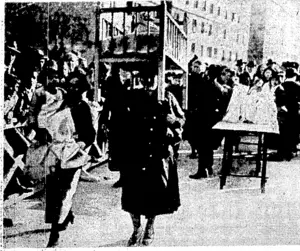 pi' Two young mothers who had just received a cot and other gifls p' during the Fascist celebrations of the "Day of the Mother and' 9;- Child" :in Rome, on December .27, hurry off ivith their trophies. (Evening Post, 11 February 1937)