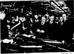 The Prime Minister, the Rt. Hon. M.:J. Savage, and .the Minister-of Finance, the Hon. W. Nash, watching m§BL 'being assembled at the Ford Mqtoi Works this. morning. '__, (Evening Post, 10 November 1937)