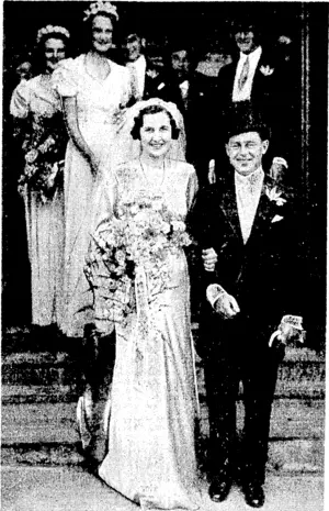 Evening Post" Photo. Mr. and Mrs. Murray E. Benjamin leaving the Synagogue, The Terrace, yesterday afternoon after their marriage, followed 'by the bridal attendants, Lady Patricia Stanhope (left) and Miss Frances Parker. The bride was formerly Miss Juliet Nathan, daughter of Mr. and Mrs. S. George Nathan, Wellington. The bridegroom is the son of Mrs. E. D. Benjamin, of Auckland, and the late Mr. Benjamin. (Evening Post, 02 December 1937)