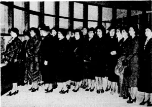 Evening Post" Photo. Members' of the Wellington Travel Club viewing the scene from the windows of the huge dining-room at the Centennial Exhibition during their visit on Wedneday afternoon. (Evening Post, 30 June 1939)