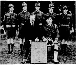 Evening-Post" Plioto. TheiGpvernor^GeneralyLord-Gcdway, is seen, yesterday afternoon addressing cadets,'bdys,,and parents of Scots College when presenting the Earl Roberts Cadet Shield, a British Empire trophy won by the college' cadet team last year. 'Below, the team, photographed after the'function. Seated next to Lord Galway is Captain G. Bedding, > who coached the team. The successful team is standing at the back; from left, Sergt. I. H. Macdonald, Sergt. P. G. Brown, Sergt. I. M. Napier, Sergt.'A.':M. Jolly, and Company SergL-MajorJ.G. Ross. 1 S. P. Andrew and .'Sqds Photo. Members' of the New Zealand Bowling Council for the 1939-40 season, who were recently appointed and will control the Centennial bowling tournament to be held in Wellington. Back row, from left,C. H. Manning (South Canterbury), H. Mayo (Hawke's Bay), D. H. Thomson (North Otago), S. Lewis (South Auckland). Middle roiv, S. C. K. Smith (Southland), A. F. Spiller (Wellington), hon. secretary, W. Gilbert (Wellington), J. Forster (Dunedin), E. T. Petty (Taranaki). Seated, G. A. Nelson (Dunedin), A. E. Whitten (Auckland), L. B. Evans (Christchurch), vice-president, 'M. /. Casey (Wellington), president, S. M. Stone (Wellington), '■ JR. B. Oakey (Christchurch), J. Kershaw (Wellington), hon. treasurer. Messrs. A. ftosking (Auckland), immediate past president, and W. /. f^M;° " <" – '\ •- *~- '^ , " *-s -X' v- ,-T. Truscott (Auckland), were absent when the \ ' -, s " * x picture ivas taken. , (Evening Post, 01 July 1939)