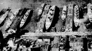 international News PbotO. One of the largest concentrations of ocean shipping ever seen at- New York is shown in this unusual picture. Eight of the biggest and fastest Atlantic liners are seen at'_ ' rest. From the left, Hamburg (22,117 tons), Bremen (51,731 tons), Columbus (32,565 tons), De Grasse (17,759 tons), Normandie (83,423 tons), Britannic (46,943 • tons), Aquitania (45,647 tons), and Conte de Savoia (48,502 tons)t (Evening Post, 31 March 1939)