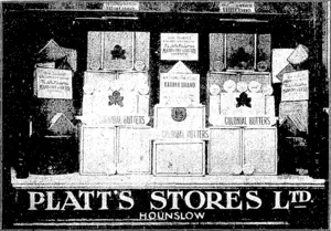 NEW ZEALAND BUTTER AT HOME. «•» Common report has it that New Zealand-made butter does not get any sort of a show whatever, as New Zealand butter, before the British public. Herewith we are able to reproduce a photograph of the contents of a window in one of Piatt's shops in Hounslow, a populous suburb of London. Several New Zealand names will be noticeable in the details of the picture. (Feilding Star, 31 August 1912)