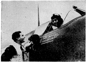 EAST INDIA" SPITFIRES—PiIots of the "East India" Squadron are here comparing a.day's adventures. (Rodney and Otamatea Times, Waitemata and Kaipara Gazette, 12 November 1941)