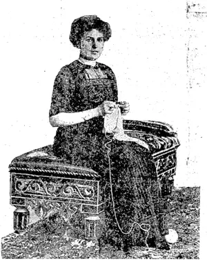 An Unconventional Photographic Study of tftie Queen of Spain Knitting. (Wanganui Chronicle, 17 June 1911)