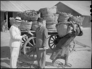 Prime Minister Peter Fraser inspecting rations, Egypt
