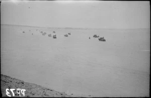 Trucks and motorcycles in artillery demonstration near Maadi - Photograph taken by R T Miller