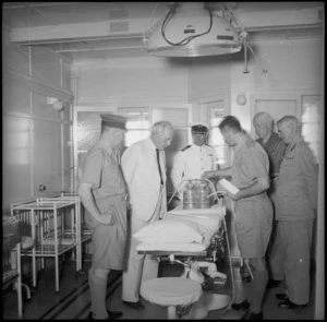 Prime Minister Peter Fraser inspecting operating theatre on board Maunganui, Port Tewfik