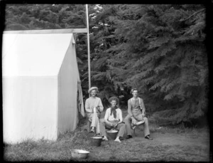 Unidentified men at camp site, next to tent, with cooking utensils, probably Christchurch district