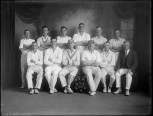Studio portrait of unidentified men's cricket team, with Nelson Challenge Shield trophy, probably Christchurch district