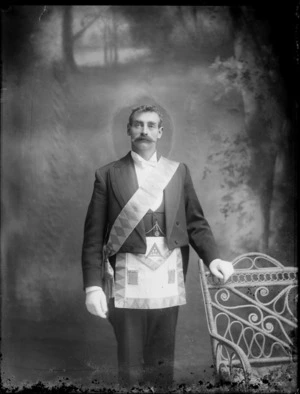 Studio portrait of unidentified man wearing Masonic costume, probably Christchurch district
