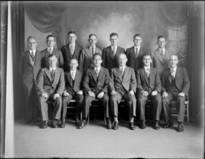 Studio portrait of unidentified men's cricket team dressed in suits, Christchurch
