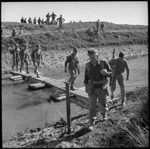 6 NZ Infantry Brigade crossing irrigation canal by footbridge, Egypt