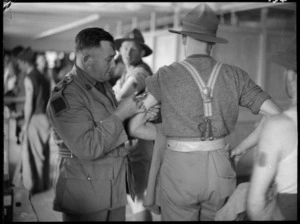 Troops vaccinated aboard ship